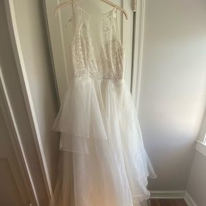 Hayley Paige tiered ball gown wedding dress.